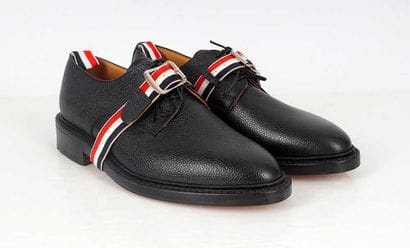 THOM BROWNE
Black grained leather lace-up...