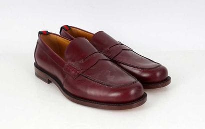 GUCCI
Burgundry leather penny loafers. 
Men's...