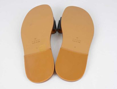 GUCCI
Brown ‘Malaga Kid’ sandals with a black...