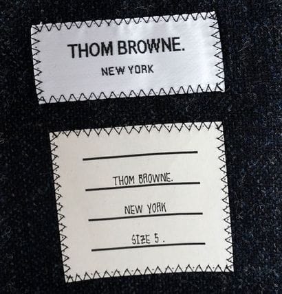 THOM BROWNE
Heather gray wool blazer with...