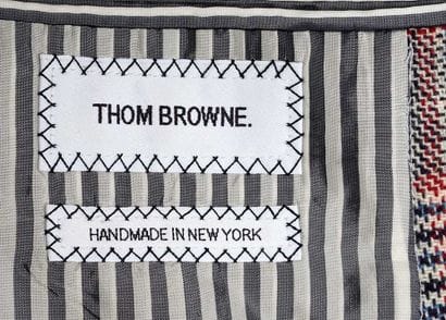 THOM BROWNE
Prince of Wales check suit jacket...
