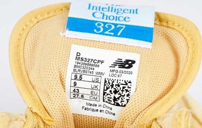 NEW BALANCE 
327 Yellow and white nylon sneakers...