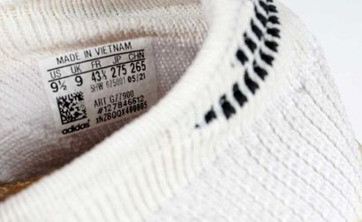 ADIDAS
NMD_S1 sneakers in “Cloud White,”...