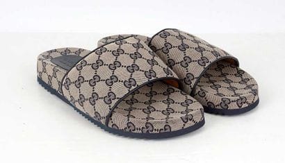 GUCCI
Beige monogrammed canvas sandals with...