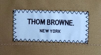 THOM BROWNE
Khaki blazer with red, white,...