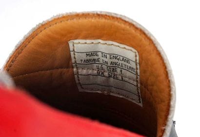 THOM BROWNE
Three-tone leather penny loafers...