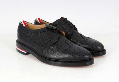 THOM BROWNE
Black grained leather brogue...
