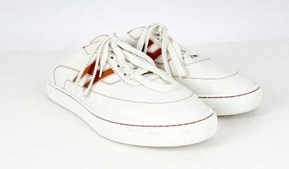 HERMÈS
‘Keep’ white leather mules with brown...