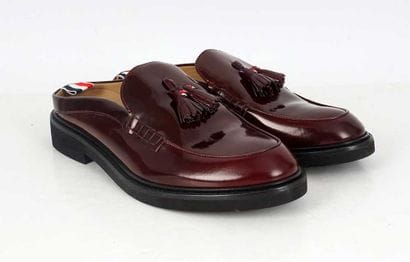 THOM BROWNE 
Burgundy patent leather mules...