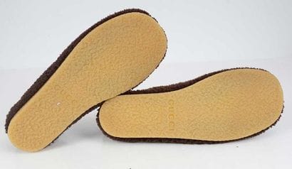 GUCCI 
Brown sheepskin loafers trimmed with...