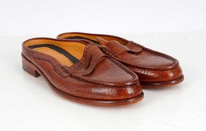 ZERBAY 
Brown braided leather mules. 
Men's...