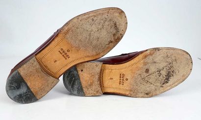 GUCCI
Burgundy leather penny loafers. 
Men's...