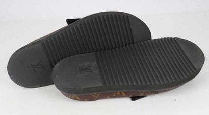 LOUIS VUITTON 
‘Cosy’ mules in brown Monogram...