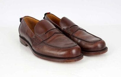 GUCCI
Brown leather penny loafers. 
Men's...