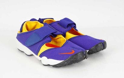NIKE
Purple and yellow 'Concord Varsity Maize'...