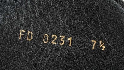 LOUIS VUITTON 
‘Cosy’ mules in brown Monogram...