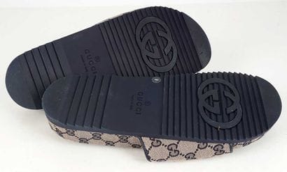 GUCCI
Beige monogrammed canvas sandals with...