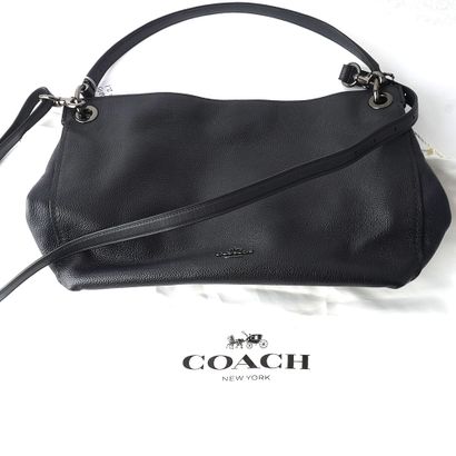 COACH
Sac Coach en cuir bleu marine, doublure...