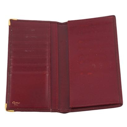 CARTIER
Portefeuilles Cartier en cuir bourgogne,...