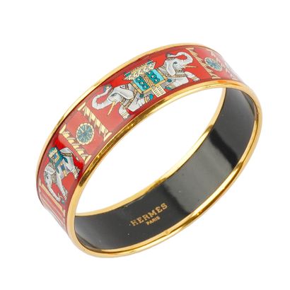 HERMÈS
Bracelet jonc Hermès Torana à motifs...