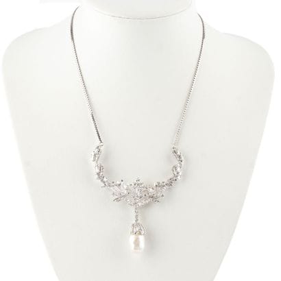 OR 10K, DIAMANTS, PERLE DE MEDU SUD
Collier...