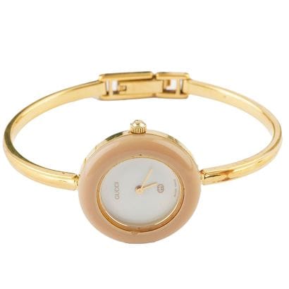 GUCCI
Montre- bracelet Gucci en métal doré,...