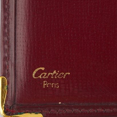CARTIER
Portefeuilles Cartier en cuir bourgogne,...