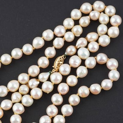 PERLES, OR 14K
Collier composé de perles...