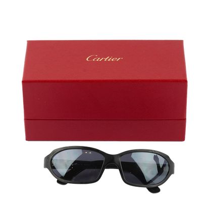 CARTIER
Lunettes de soleil Cartier, modèle...