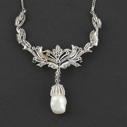 OR 10K, DIAMANTS, PERLE DE MEDU SUD
Collier...