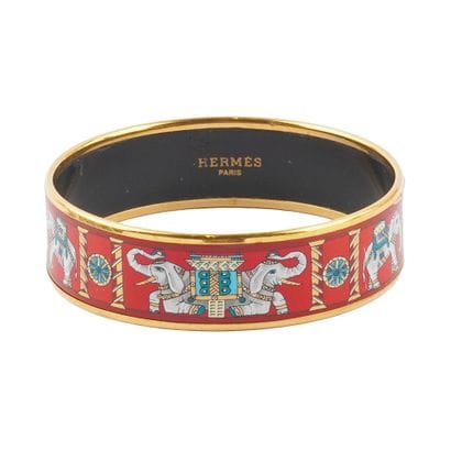 HERMÈS
Bracelet jonc Hermès Torana à motifs...
