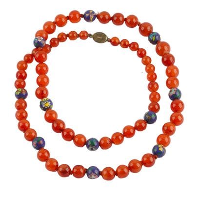AGATE
Collier composé de billes d'agate entrelaccé...