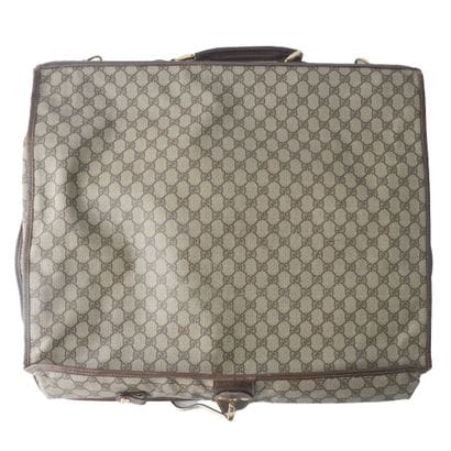 GUCCI
Porte-vetêments Gucci en toile monogrammé...