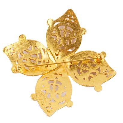 CHANEL
Broche Chanel en métal doré, édition...