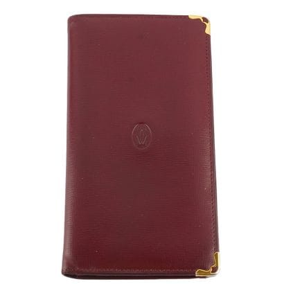 CARTIER
Portefeuilles Cartier en cuir bourgogne,...