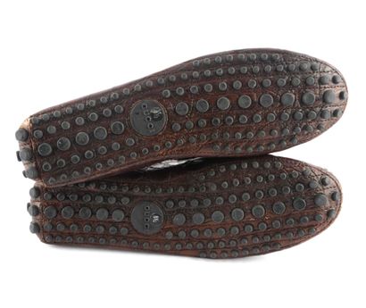 GUCCI
Mocassins Gucci en cuir marron embossé.
Taille:...