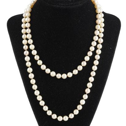 PERLES, OR 14K
Collier composé de perles...