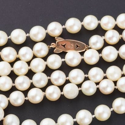 PERLES, OR 14K
Collier composé de perles...