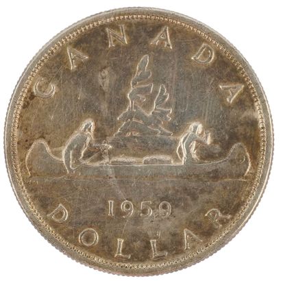 1$ CANADA 1959
Une pièce de 1 dollar de Canada...