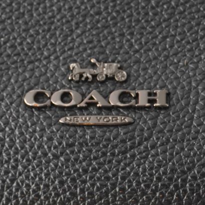 COACH
Sac Coach en cuir bleu marine, doublure...