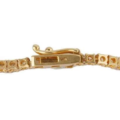 OR 14K, DIAMANTS
Collier rivière en or jaune...