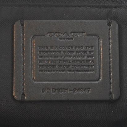 COACH
Sac Coach en cuir bleu marine, doublure...