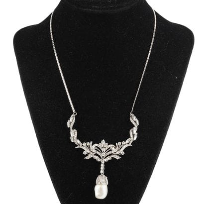 OR 10K, DIAMANTS, PERLE DE MEDU SUD
Collier...