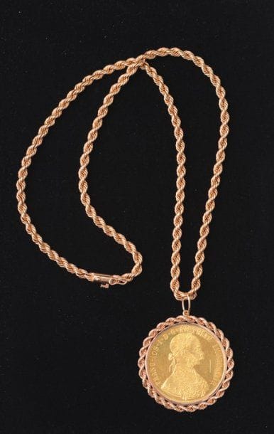 Pendentif en or jaune 18kt serti d'une pièce...