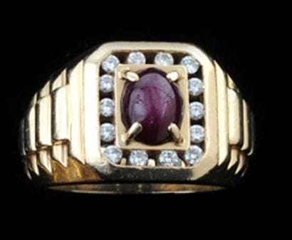 Bague en or jaune 14kt sertie d'un saphir...