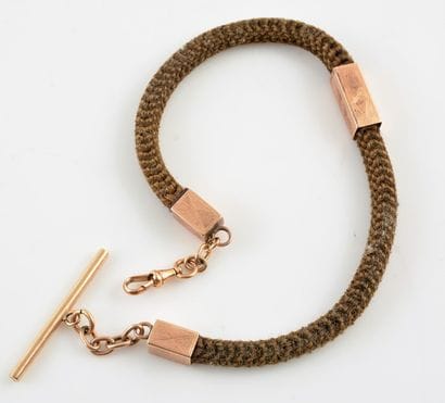 OR 14K ET CRIN DE CHEVAL
Chaîne de montre...