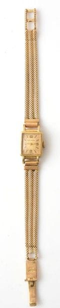 MOVADO - OR 18K
Bracelet-montre de dame en...