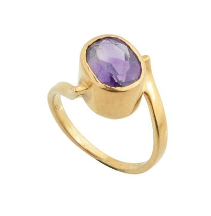 OR 18K
Bague en or jaune 18K orné de verre...