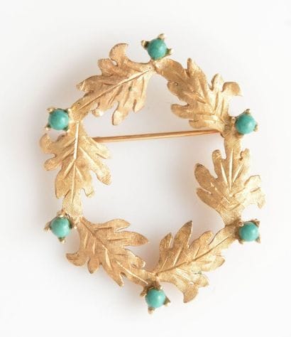 OR 14K ET TURQUOISES
Broche en or jaune 14K...