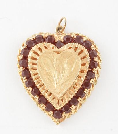 OR 14K *Pendentif en or jaune 14K en forme...